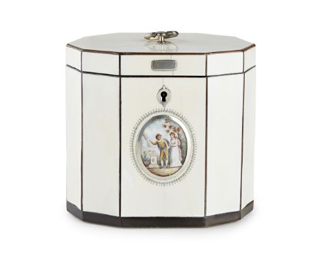 GEORGIAN IVORY AND HORN-BANDED TEA CADDY  LATE 18TH CENTURY   of decahedron form with a hinged lid and loop handle, the front