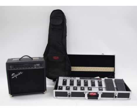 Behringer FCB1010 midi foot controller within a Stagg pedal board flight case; also a Squier by Fender Champ 15GA practice am