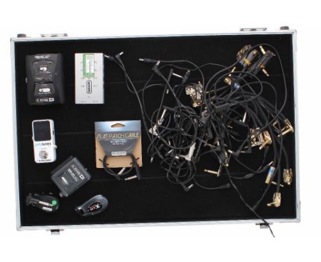Warwick Rock Case pedal board flight case; together with a TC Electronic Polytune 2 mini guitar pedal, a Line 6 G30 wireless 