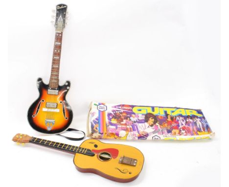 Vintage Chad Valley children's guitar, boxed; together with another Japanese made tin guitar bearing a T.N. trademark stamp (