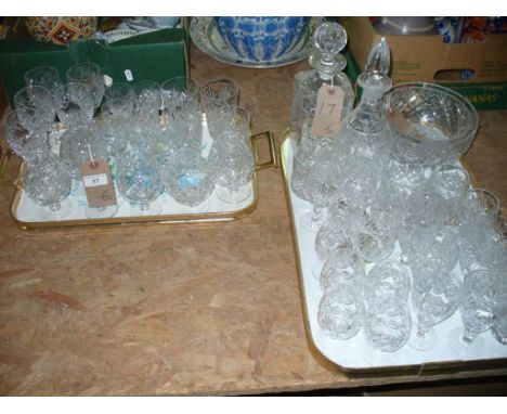 A collection of Tutbury glass.  Comprising six wine glasses, each with conical bowls, facet cut decoration above ovals raised