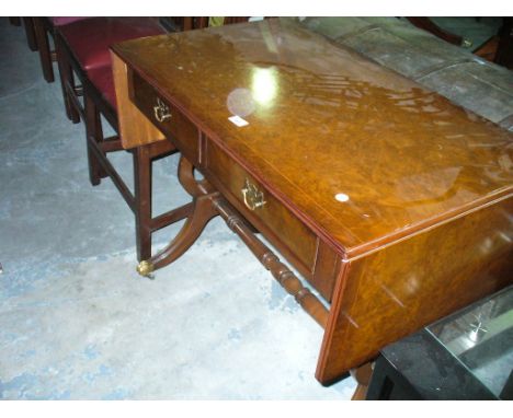 A Reproduction burr walnut sofa table with 2 frieze drawers.