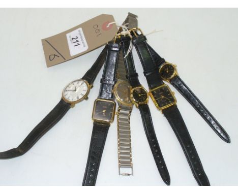 6 assorted wristwatches including Timex and Gucci each with a leather strap.