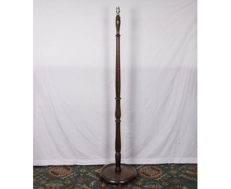 A standard lamp and shade