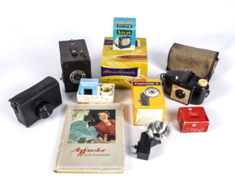 A selection of vintage photographic equipment including a Conway 6 x 9 cm film camera, Kodak Brownie 127 camera, various slid