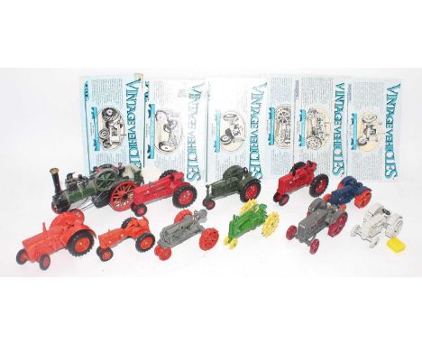 One box containing a quantity of various Ertl vintage tractors, all loose with a quantity of various information cards, also 