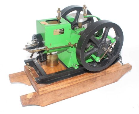 A very well made "Hit and Miss" stationary engine, comprising of green hand painted body, with makers plaque to read "P.Harre