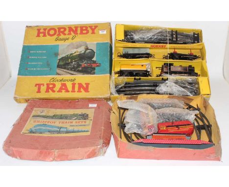 Two '0' gauge sets:- 1957-65 Hornby no 45 tank goods set comprising 0-4-0 c/w BR82011 tank loco (F-G) with 3 wagons, track (F