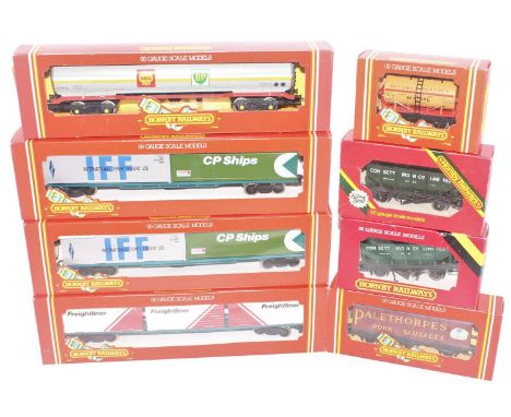 Ten Hornby goods wagons:- R669 Shell-BP 100 ton tank, R035 freightliner with containers, 2 x R036 with CP and IFF with 6 x 4 