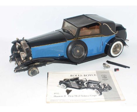 Pocher 1:8 scale model of a Rolls Royce Phantom II Drop Head Sedanca Coupe, finished in black and blue, model requires finish