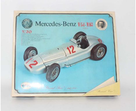 A Revival Cars 1/20 scale white metal and plastic kit for a Mercedes Benz W 154-M163 1939 race car, housed in the original bo