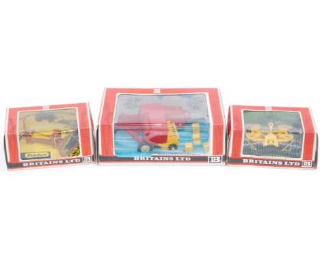 Britains group of 3 boxed 1:32nd scale farm models as follows: Britains Farm 1/32 No. 9556 Hay Baler in red, No.9535 Muledoze