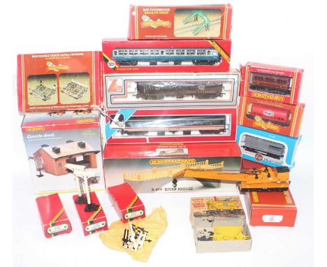 Large tray containing boxed items:- Hornby R499 river bridge; R8002 goods shed; R076 footbridgel R657 girder bridge R636 doub