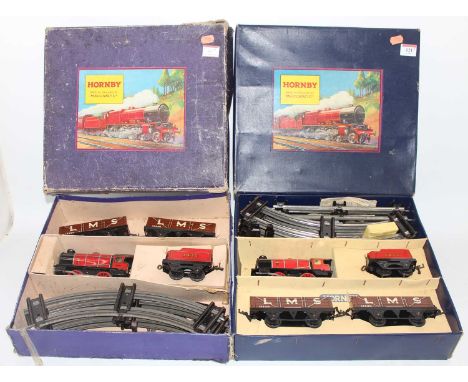 Two Hornby M1 good sets: one with red loco and 3435 tender with 2x LMS open wagons, track, clips (E-BE), another set, same co