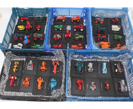 Forty-three various plastic and diecast scale tractor models, all housed on original plastic display plinths, examples to inc