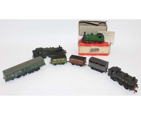 Box containing: 0-6-0 pannier tank body on a Dublo 2-rail R1 chassis; motorised Kitmaster Prairie 2-6-2 tank, 2 rail; Wagon M