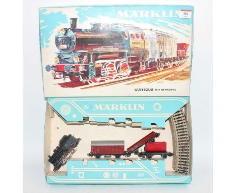 Marklin HO train set ref. 3200 comprising 0-6-0 tank loco, goods van, tipper wagon and 3-plank open with track, contents (E-N