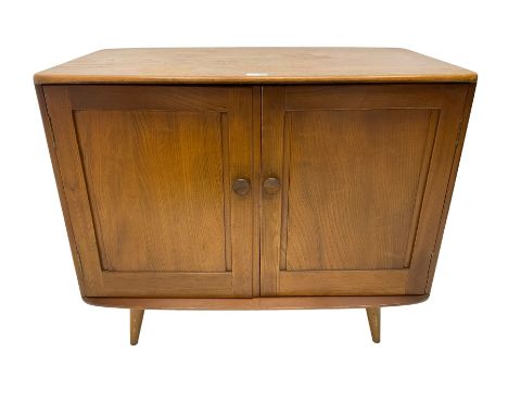 Ercol elm side cupboard, enclosed by two panelled doorsDimensions: Height:&nbsp;74cm&nbsp; Length/Width:&nbsp;87cm&nbsp; Dept