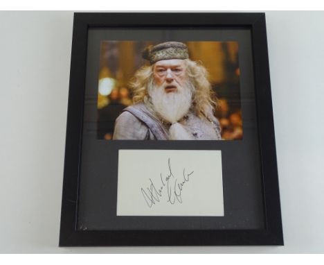 HARRY POTTER: A framed and glazed MICHAEL GAMBON display of photograph as Professor Dumbledore and signed card - PROVENANCE: 