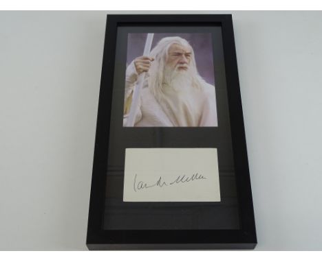 LORD OF THE RINGS: A framed and glazed IAN MCKELLAN display of photograph as Gandalf and signed card - PROVENANCE:  The Alex 