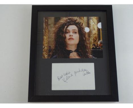 HARRY POTTER: A framed and glazed HELENA BONHAM CARTER display of photograph as Bellatrix Lestrange and signed card - PROVENA