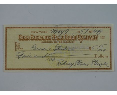A ROD STEIGER signed cheque dated May 7th 1954 - this has been independently checked and will be supplied with a Certificate 