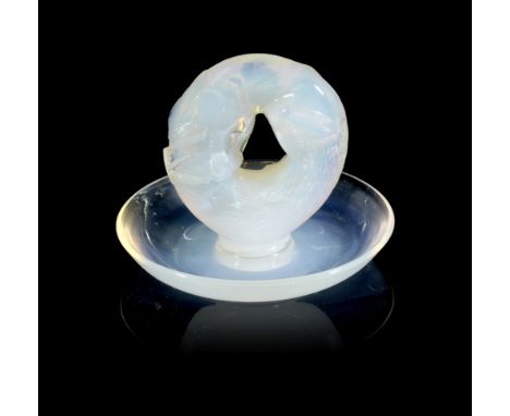 René Lalique (French, 1860-1945)A Rare Pre-War 'Alaska' Cendrier, design introduced in 1931opalescent glass, mould-pressed, f