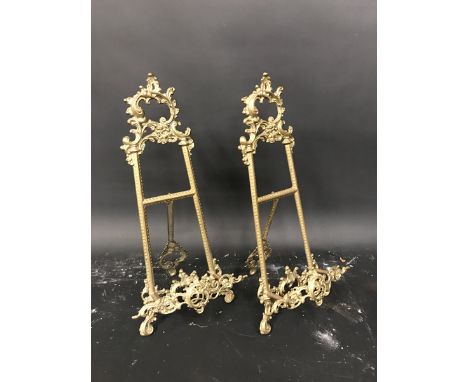 19th Century English School. An Ornately Cast Brass Easel, 21.25" x 9.5", and a companion piece, a pair (2).