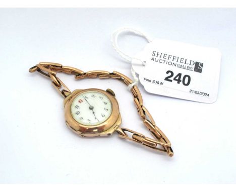 A Vintage 9ct Rose Gold Cased Ladies Wristwatch, the white dial with black and red Arabic numerals, movement stamped "Swiss M