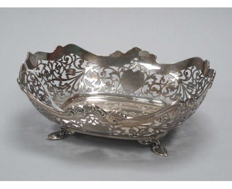 A Decorative Pierced Hallmarked Silver Dish, HA, Sheffield 1919, of shaped design, scroll pierced with vacant heart shape pan