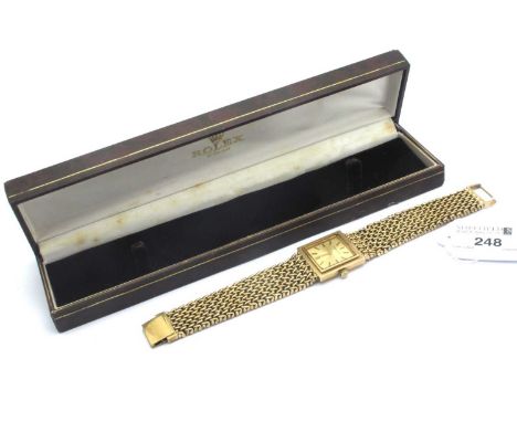Bueche-Griod; A 9ct Gold Cased Gent's Wristwatch, the signed rectangular dial with line markers, within plain 9ct gold case, 