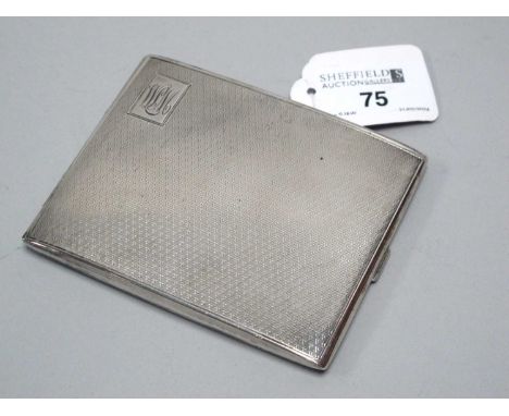 A Hallmarked Silver Cigarette Case, CBros, Birmingham 1932, of rectangular form, allover engine turned decoration, initialled