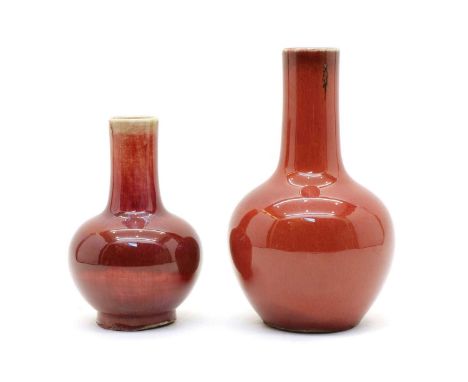A Chinese flambé glazed vase, of globular form on a circular foot, the crackled glaze ranging from dark red to light blue ton