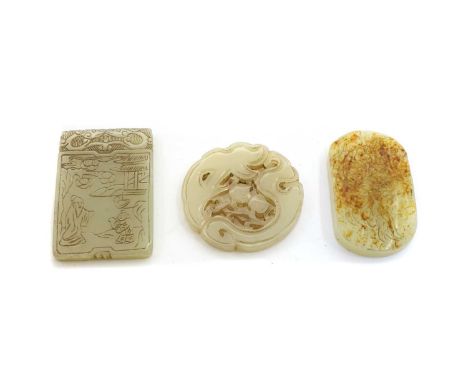 Three Chinese carved jade plaques, comprising one rectangular, with a literatus and a boy under a pine tree, the reverse with