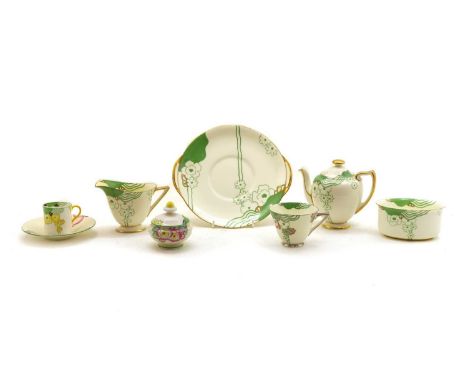 A collection of Royal Doulton Glamis pattern teawares, three saucers, four cups, two milk jugs, an oval sugar bowl, a teapot,