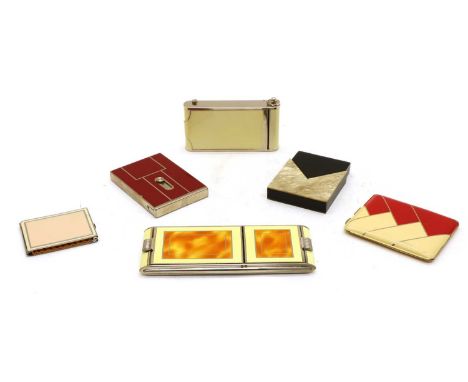 Two combination ladies cigarette cases and compacts, two further cigarette cases, a match holder, and a faux mother-of-pearl 