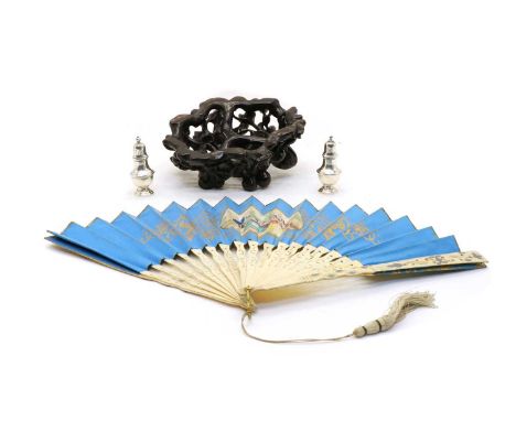 A pair of silver pepperettes, Birmingham 1912, 8cm high, together with a painted, and transfer decorated fan 49cm open, and a