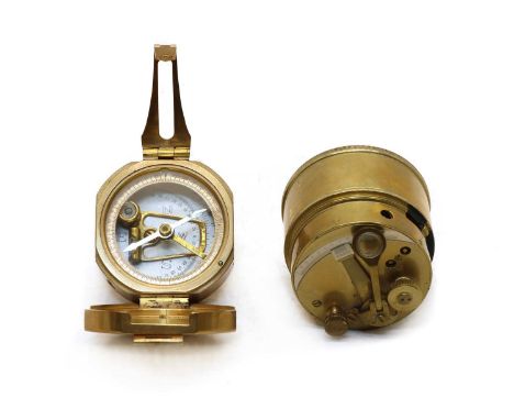 A marine compass, by Wild &amp; Co, London, 7cm wide, together with a similar Newman &amp; Guardia clockwork timer (2)Conditi