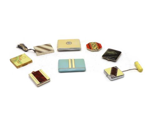A collection of eight ladies compacts, the largest mounted with three girls in profile, 9.5cm, a light blue compact with a sp