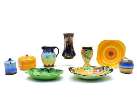 A collection of various Art Deco pottery, comprising Carltonware and Crown Devon vases, five Shelley plates, five preserve po