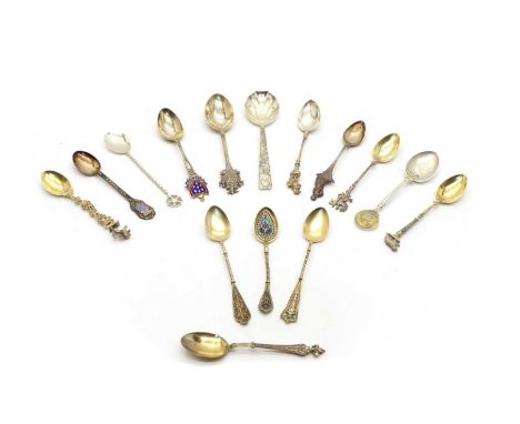 A collection of silver souvenir spoons, to include two plique-a-jour examples, each dated 1891 with '830' mark, another simil