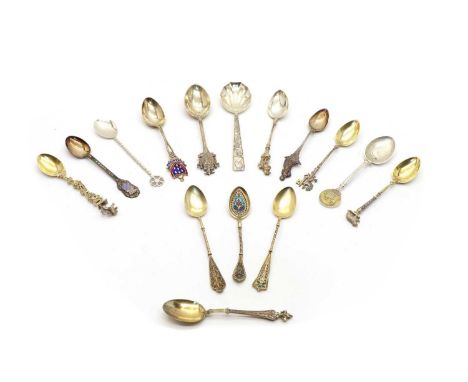 A collection of silver souvenir spoons, to include two plique-a-jour examples, each dated 1891 with '830' mark, another simil