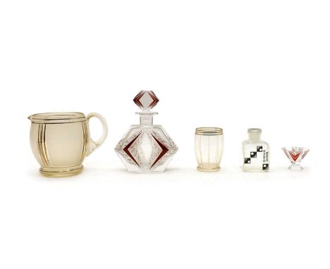 An Art Deco clear glass and cranberry liqueur set, with painted panels and cranberry panels, decanter 20.5cm high, a lemonade