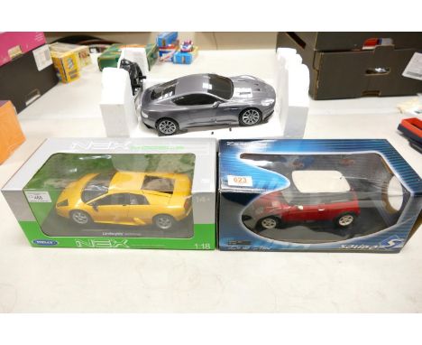 Boxed 1:18th Scale Model Cars including: Solido Mini Clubman, Welly Lamborgini Murcielago &amp; M&amp; S radio Control Aston 