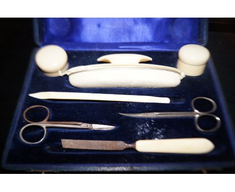 Cased vintage Ivorine manicure set 