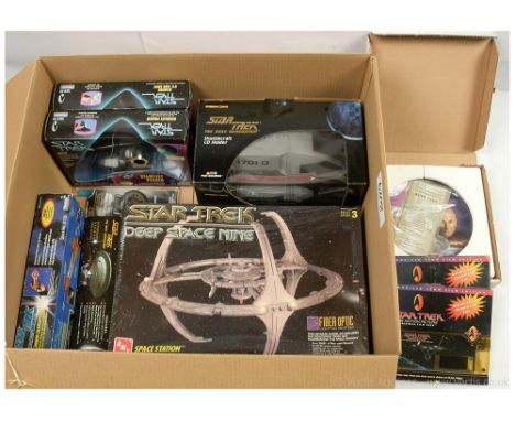 Quantity of Star Trek collectables includes Fun Source The Next Generation Shuttlecraft CD Holder, AMT Ertl Deep Space Nine S
