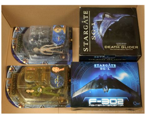 Quantity of Diamond Select Toys Stargate SG-1 action figures including Thor and Vala Mal Doran. Also includes a QMX F-302 Fig