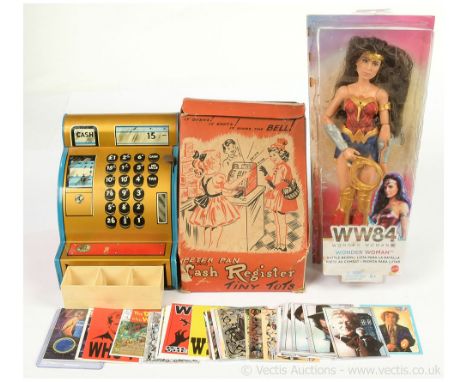 Mattel DC Comics Wonder Woman WW84 battle ready 12" doll, Good, within Fair opened packaging. Peter Pan tin plate cash regist