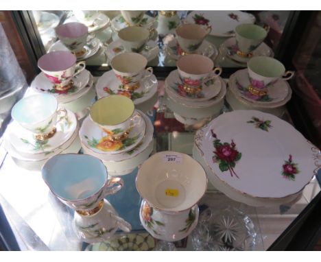 A Royal Standard china part tea service World Famous Roses design by Harry Wheatcroft, 20 pieces (lacking a saucer)