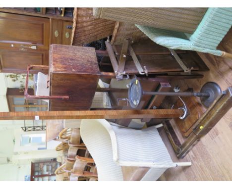 A 1930s walnut square standard lamp, a smokers stand, two sewing boxes, a fire fender and a trouser press (6)